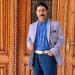 عکسی از رحمت امینی‌شالیکار هزارجریبی در کنار پسرش به مناسبت روز پسر!